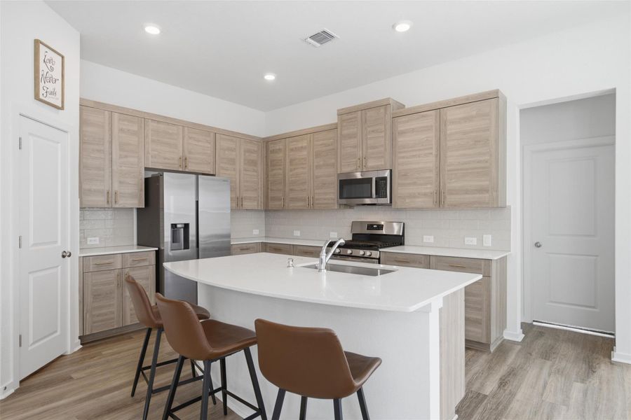 Furnished interior view inside a new home in , Manor (Image 10).