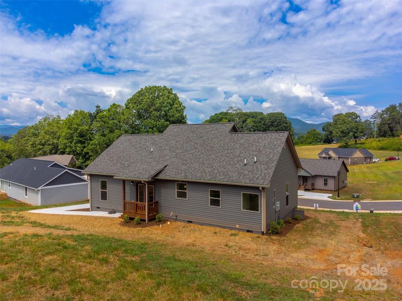 Front exterior of a new home in , Franklin, NC, highlighting curb appeal (Image 21).