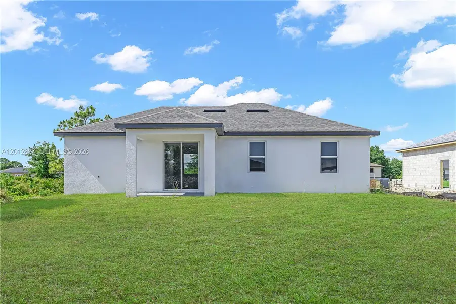 Exterior details and patio area of a home in , Lehigh Acres (Image 3).