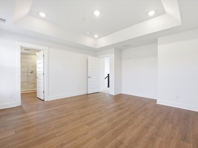 Spacious, unfurnished interior of a new home in The Coves at Lakes of Cane Bay II, Summerville (Image 13). Spacious, unfurnished interior of a new home in The Coves at Lakes of Cane Bay II, Summerville (Image 13).