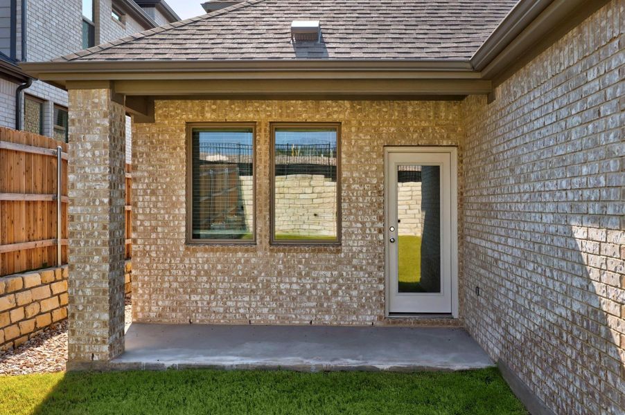 Front exterior of a new home in Lakeside at Tessera, Lago Vista, TX, highlighting curb appeal (Image 24).