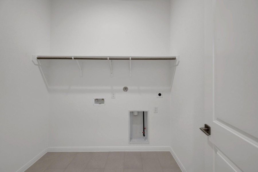 Spacious, unfurnished interior of a new home in Meridiana - Terrace Collection, Manvel (Image 10).