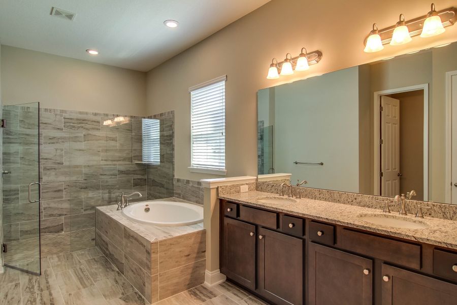 Representative furnished interior of a home built from the Lena by Riverside Homes in Hidden Creek at SilverLeaf 70' Series, St. Augustine (Image 11).