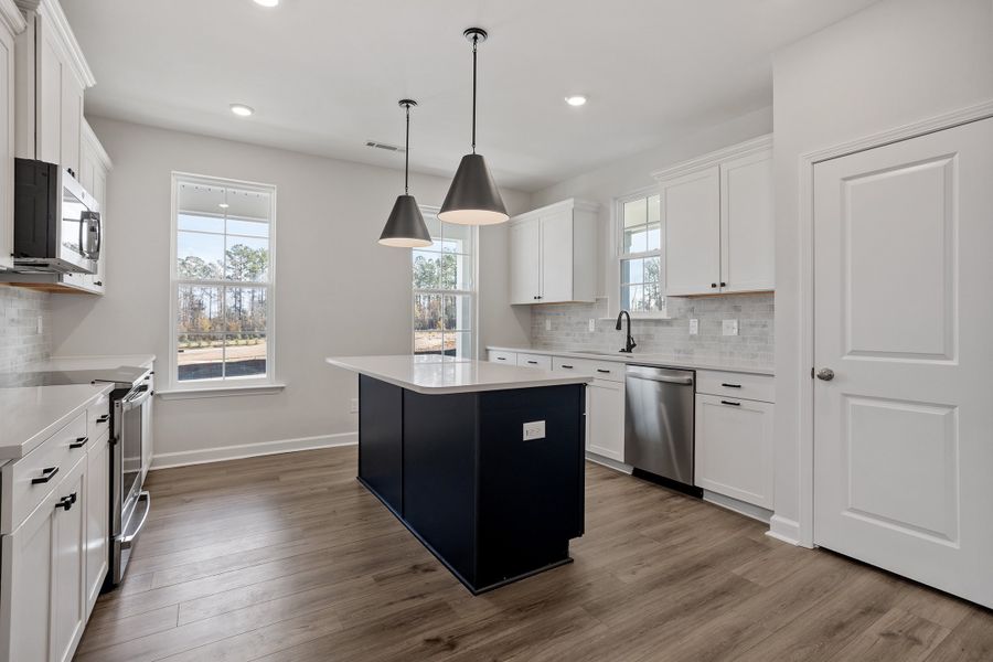Furnished interior view inside a new home in Renaissance at White Oak, Garner (Image 6).