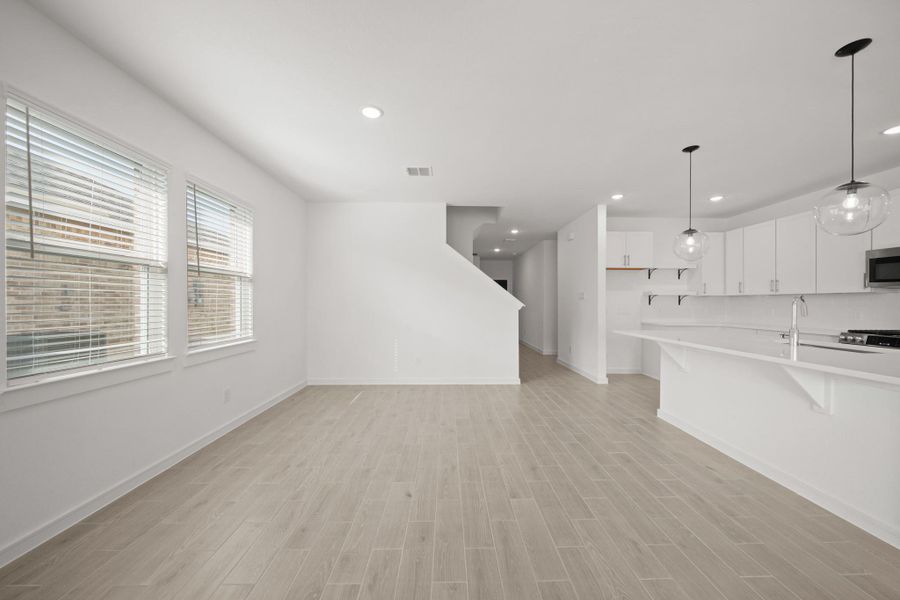 Sun-lit dining area (*Photo not of actual home and used for illustration purposes only.)