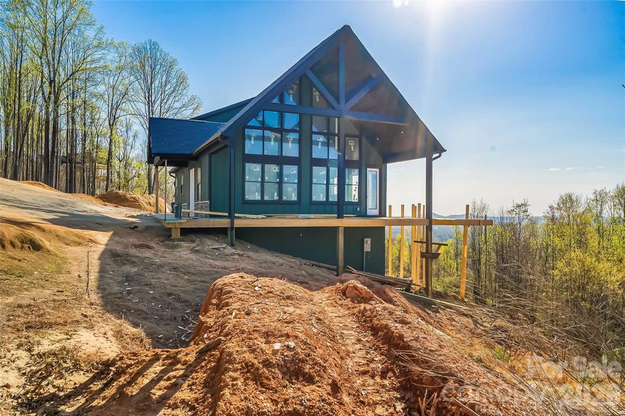 Side elevation with long range mountain views Side elevation with long range mountain views