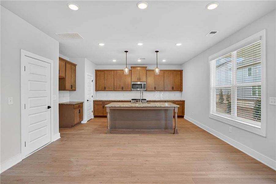 Furnished interior view inside a new home in The Fairways at Mirror Lake, Villa Rica (Image 6).