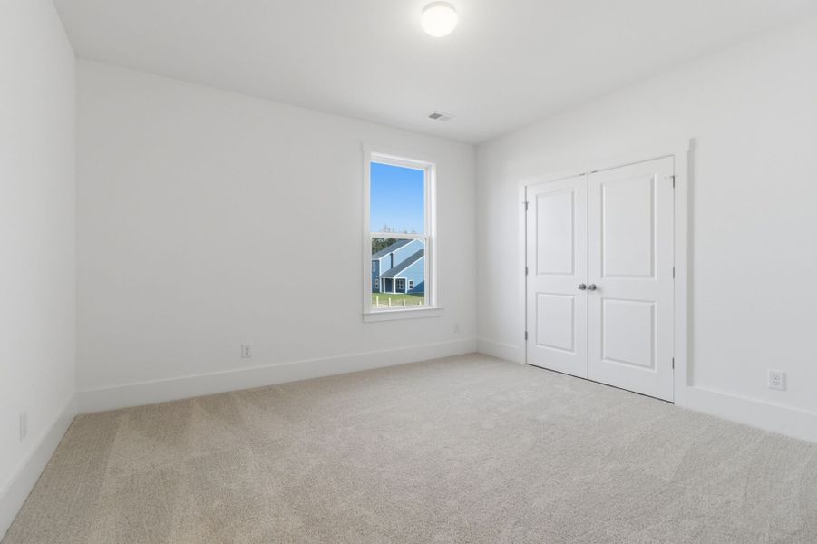 Spacious, unfurnished interior of a new home in Homecoming, Ravenel (Image 22).