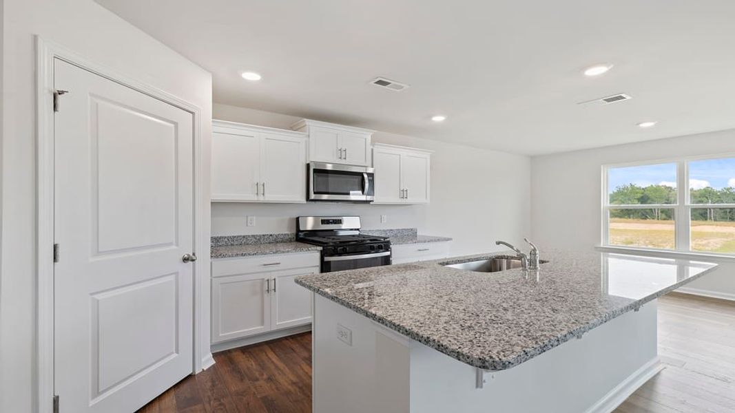 Furnished interior view inside a new home in Harrier Point, Woodruff (Image 9).