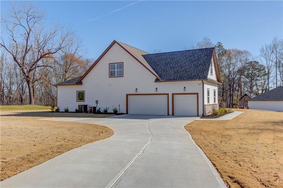 Front exterior of a new home in , Jefferson, GA, highlighting curb appeal (Image 30).