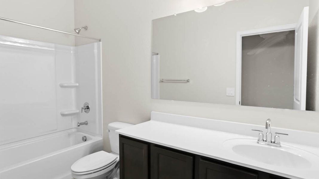 Representative furnished interior of a home built from the McCormick by D.R. Horton in Rio Rancho Estates, Surprise (Image 10).