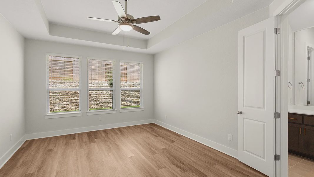 Representative unfurnished interior of a home built from the Brenner by Chesmar Homes in Newhaven, Manor (Image 38).