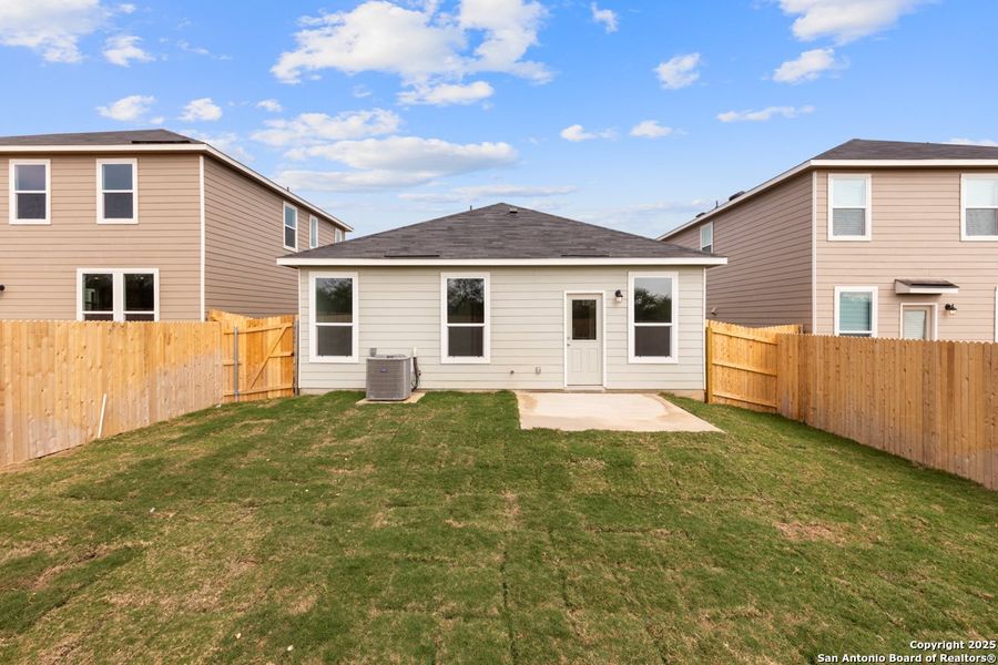 Exterior details and patio area of a home in Southton Cove, Elmendorf (Image 3). Exterior details and patio area of a home in Southton Cove, Elmendorf (Image 3).