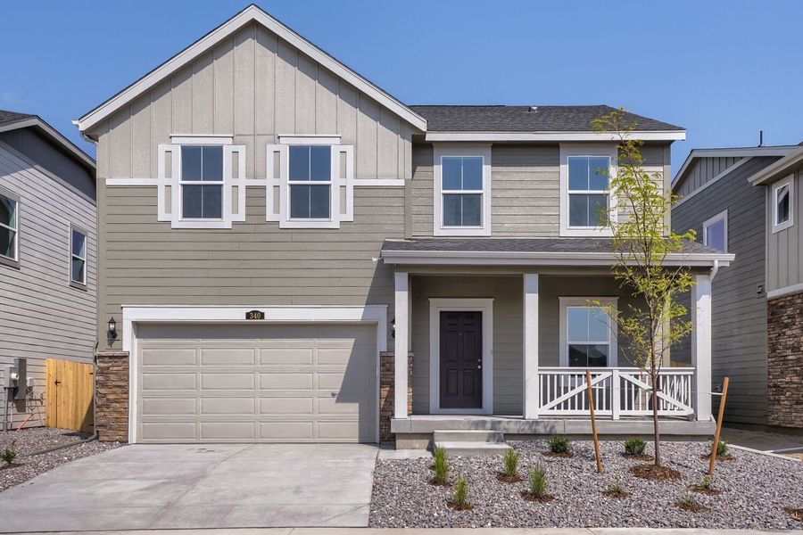 Front exterior of a new home in Muegge Farms, Bennett, CO, highlighting curb appeal (Image 1). Front exterior of a new home in Muegge Farms, Bennett, CO, highlighting curb appeal (Image 1).