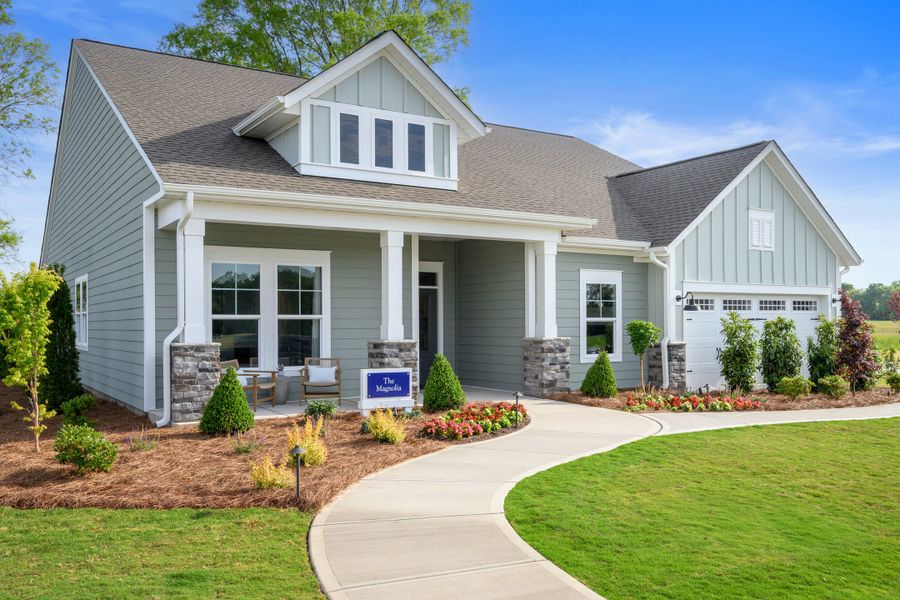 Front exterior of a new home in Encore at Harmony, Harrisburg, NC, highlighting curb appeal (Image 2). Front exterior of a new home in Encore at Harmony, Harrisburg, NC, highlighting curb appeal (Image 2).