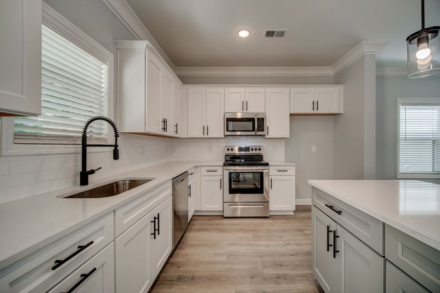 Representative furnished interior of a home built from the Draper by Parkside Builders in The Woods, Gallatin (Image 10).