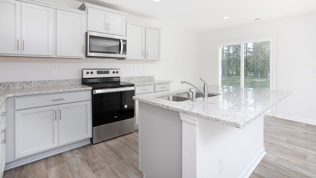 Representative furnished interior of a home built from the Oliver by D.R. Horton in Carter Ridge, Greenville (Image 4).