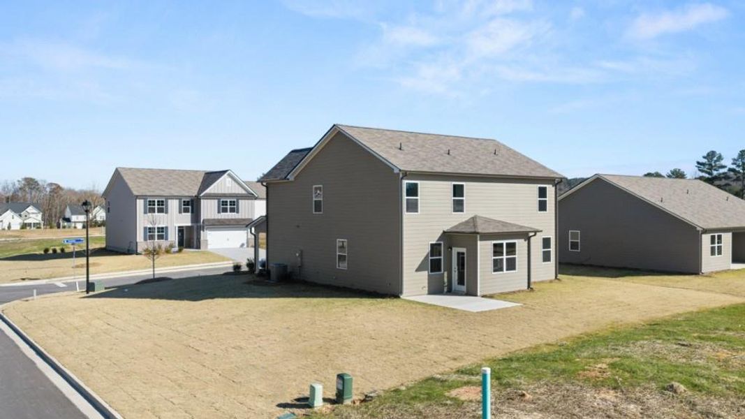 Exterior details and patio area of a home in Fairway 17 at Mirror Lake, Villa Rica (Image 4).