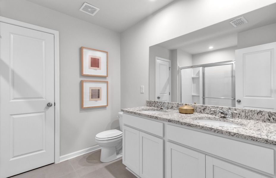 Furnished interior view inside a new home in Carpenter Falls, Durham (Image 8).
