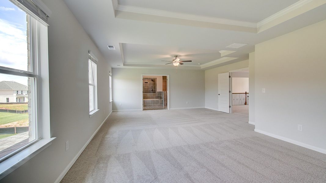 Furnished interior view inside a new home in Westwind Estates, Hampton (Image 26).