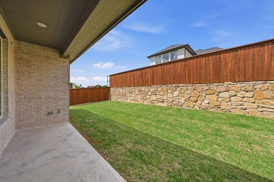 Exterior details and patio area of a home in Custer Ridge Estates, Allen (Image 4). Exterior details and patio area of a home in Custer Ridge Estates, Allen (Image 4).