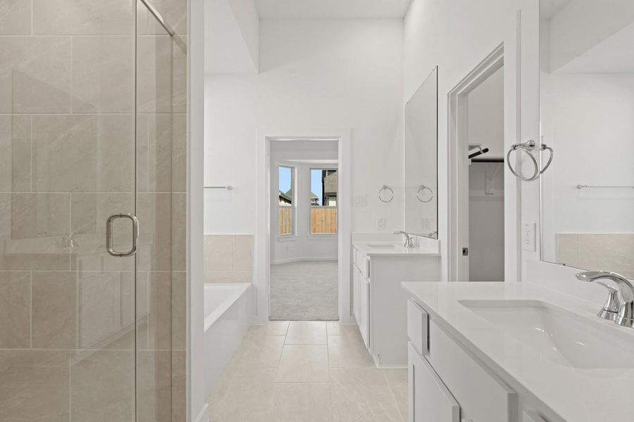 Furnished interior view inside a new home in Sunterra, Katy (Image 7).