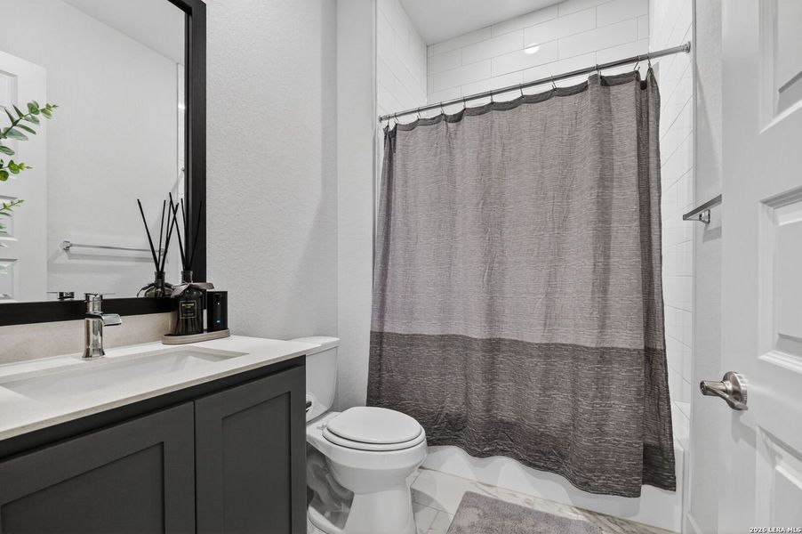 Furnished interior view inside a new home in Pradera Ridge, Floresville (Image 12).