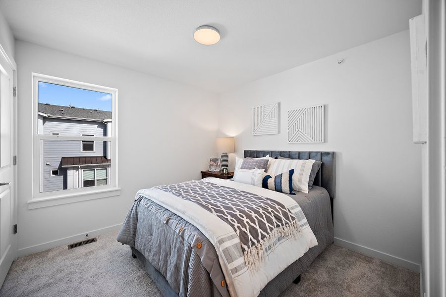 Furnished interior view inside a new home in The Commons at Victory Ridge, Colorado Springs (Image 15).