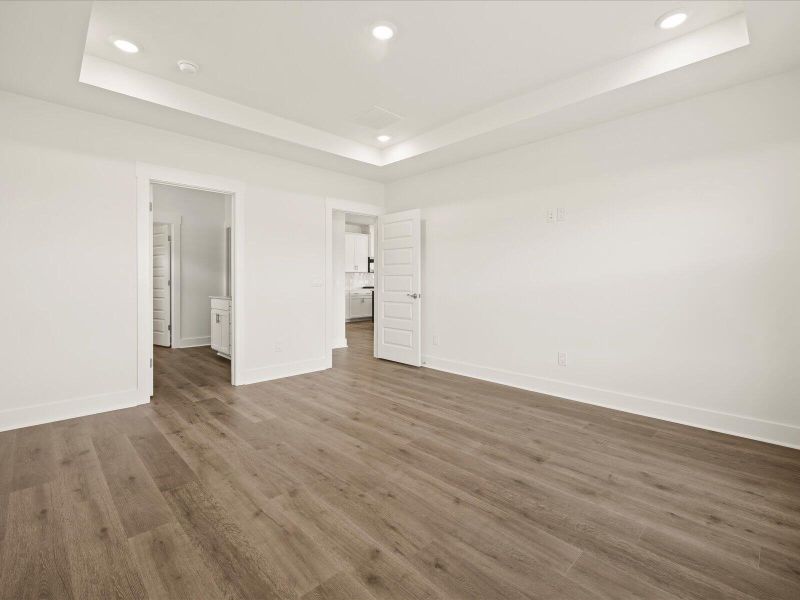 Spacious, unfurnished interior of a new home in The Coves at Lakes of Cane Bay, Summerville (Image 18). Spacious, unfurnished interior of a new home in The Coves at Lakes of Cane Bay, Summerville (Image 18).