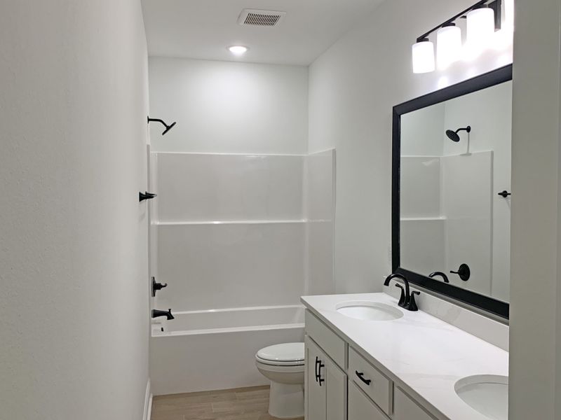 Furnished interior view inside a new home in Sentinel Ridge, Pace (Image 10).