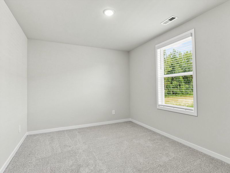 Spacious, unfurnished interior of a new home in The Heritage at Buffaloe Reserve, Raleigh (Image 19).