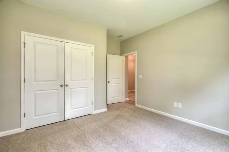 Representative unfurnished interior of a home built from the Sinclair by True Homes in Enclave at Wild Rose, Rock Hill (Image 17). Representative unfurnished interior of a home built from the Sinclair by True Homes in Enclave at Wild Rose, Rock Hill (Image 17).