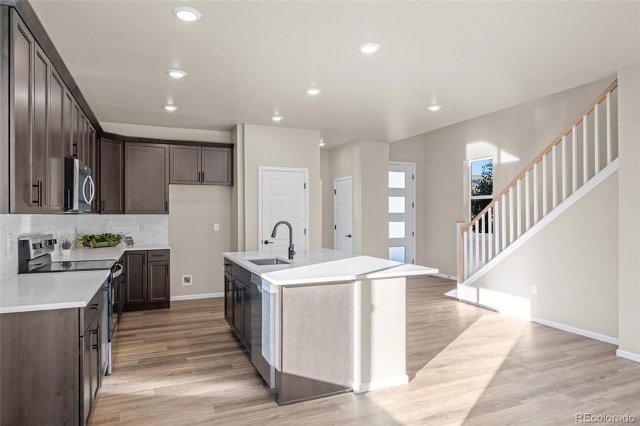 Furnished interior view inside a new home in Painted Prairie, Aurora (Image 16).
