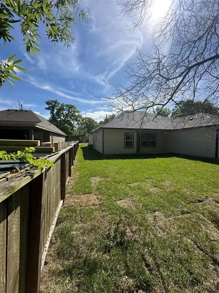 Exterior details and patio area of a home in , Huffman (Image 2). Exterior details and patio area of a home in , Huffman (Image 2).