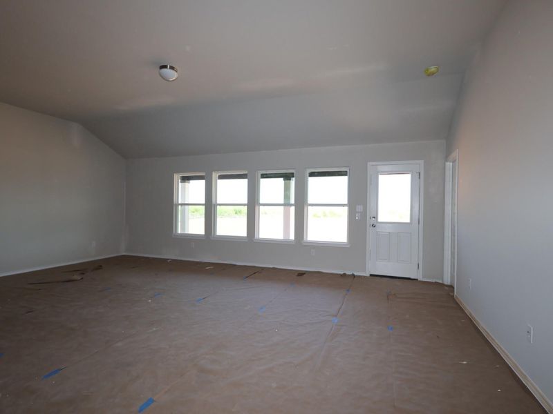 In-progress construction of a new home in Carillon, Manor, TX (Image 6).