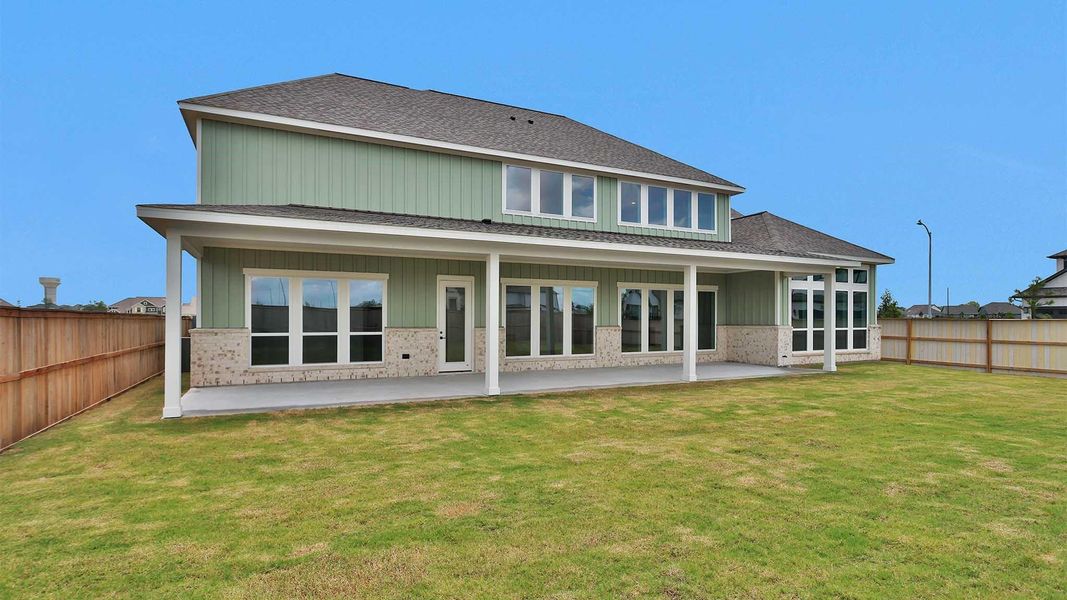 Exterior details and patio area of a home in Fulshear Lakes, Fulshear (Image 3).