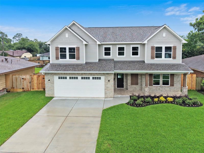 Front exterior of a new home in , Houston, TX, highlighting curb appeal (Image 18).