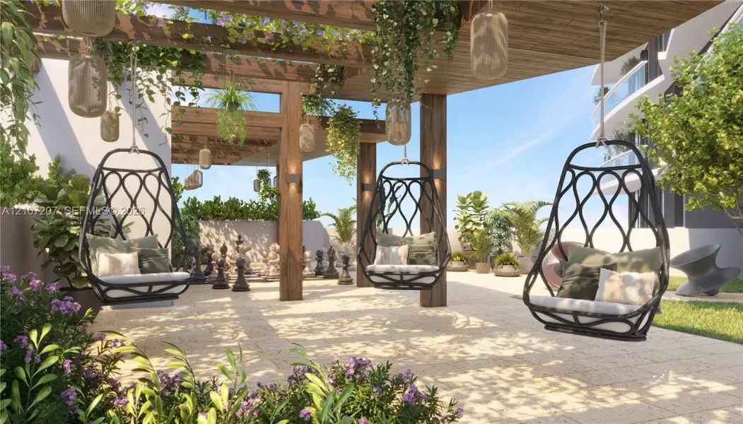Outdoor terrace featuring a wooden pergola, stone paver flooring, perimeter landscaping, and integrated wall lighting Outdoor terrace featuring a wooden pergola, stone paver flooring, perimeter landscaping, and integrated wall lighting