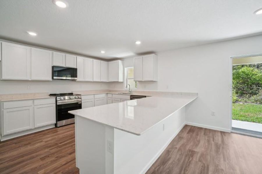 Furnished interior view inside a new home in Royal Highlands, Weeki Wachee (Image 4).
