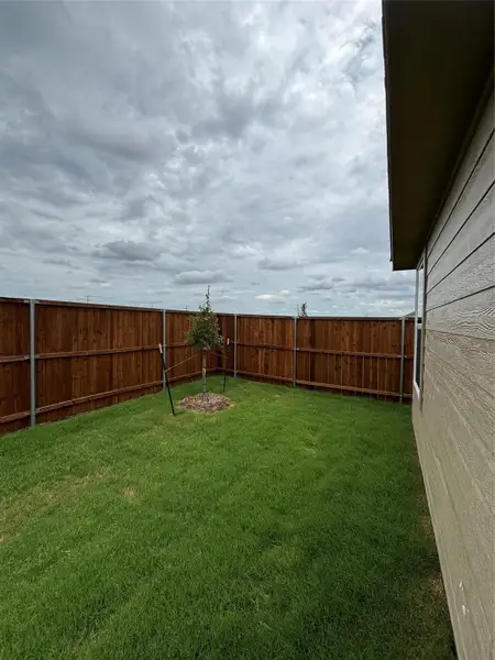 Exterior details and patio area of a home in Binford Creek, Waller (Image 25).
