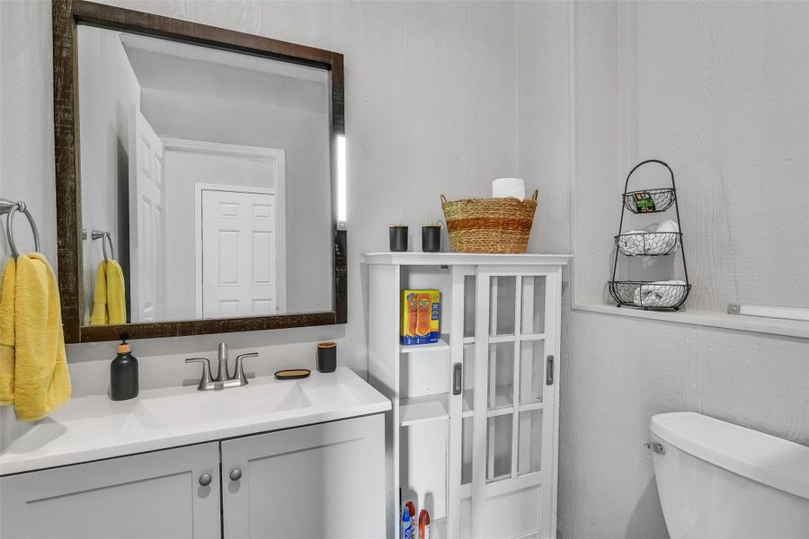 Convenient half bath in garage