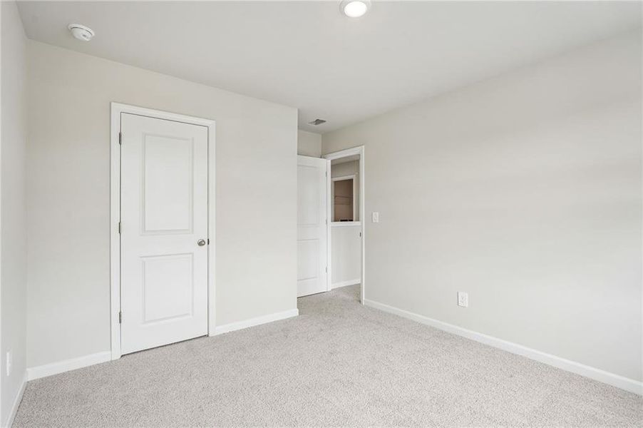 Spacious, unfurnished interior of a new home in Northwoods at Mirror Lake, Villa Rica (Image 55).
