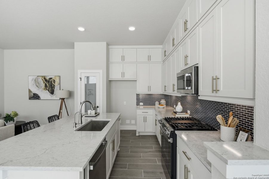 Furnished interior view inside a new home in Centero at Stone Oak, San Antonio (Image 8). Furnished interior view inside a new home in Centero at Stone Oak, San Antonio (Image 8).