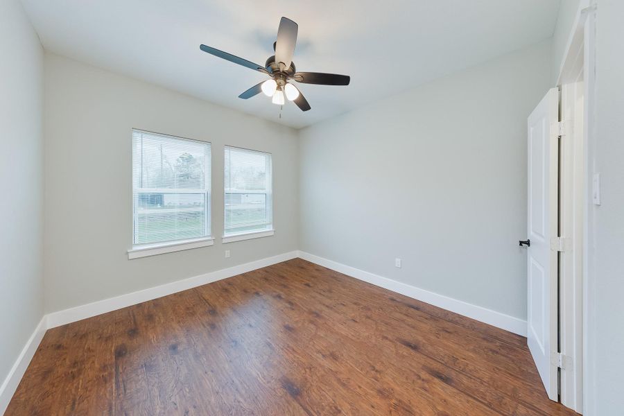 Third bedroom filled with natural light, creating a bright and airy space perfect for rest or a home office. Third bedroom filled with natural light, creating a bright and airy space perfect for rest or a home office.