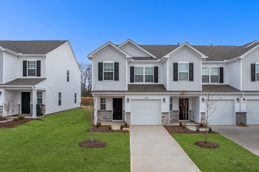 Front exterior of a new home in The Maple, Inman, SC, highlighting curb appeal (Image 1). Front exterior of a new home in The Maple, Inman, SC, highlighting curb appeal (Image 1).
