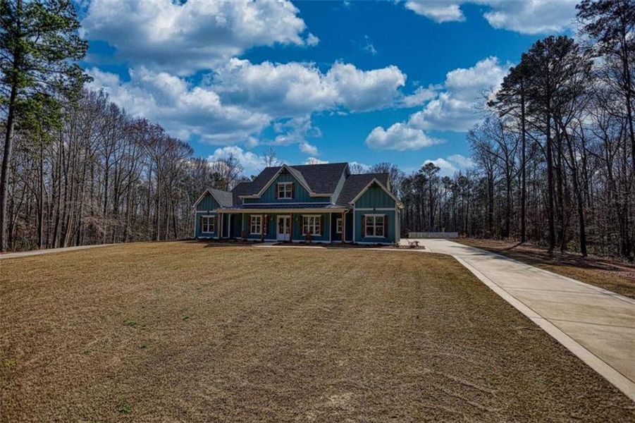 Front exterior of a new home in , Good Hope, GA, highlighting curb appeal (Image 27).