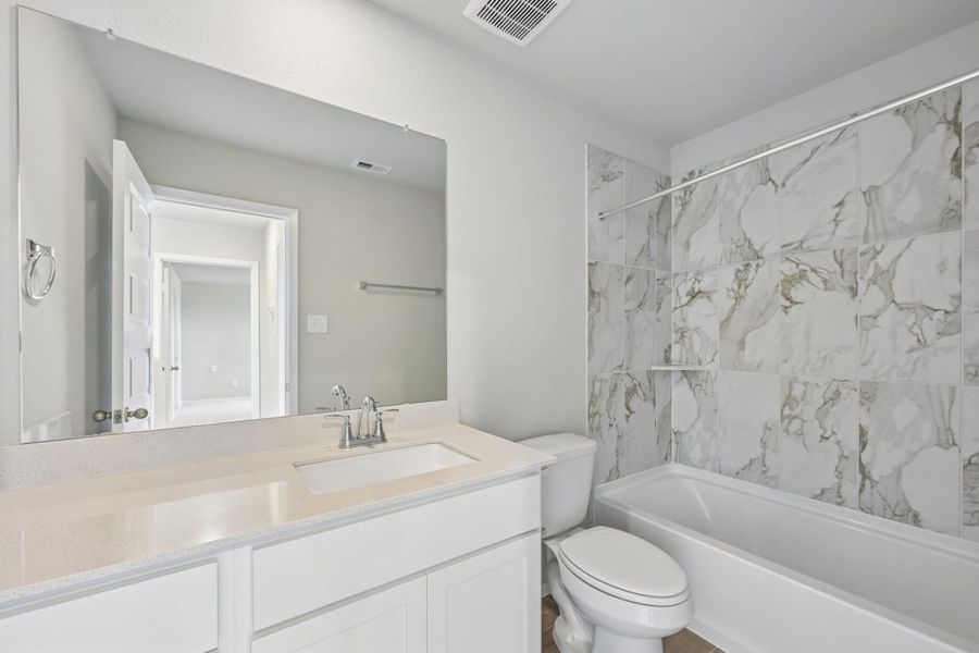 Furnished interior view inside a new home in Azalea, Pattison (Image 13).