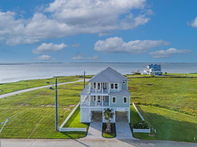 Front exterior of a new home in , Galveston, TX, highlighting curb appeal (Image 28).