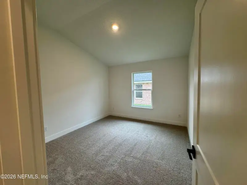 Spacious, unfurnished interior of a new home in Shadow Crest at Rolling Hills, Green Cove Springs (Image 15).