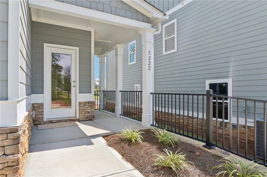 Exterior details and patio area of a home in Magnolia Trace, Flowery Branch (Image 17).